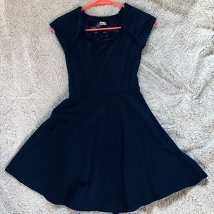Navy blue lace back skater dress.